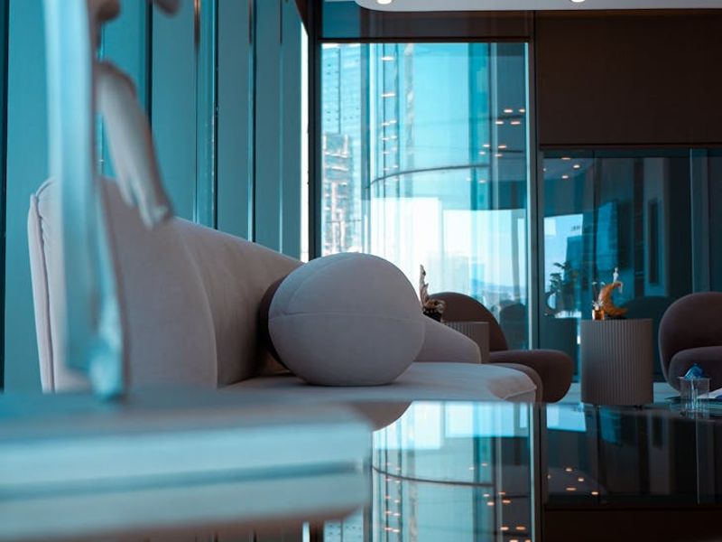 A serene and spacious room with soft lighting for exercise.